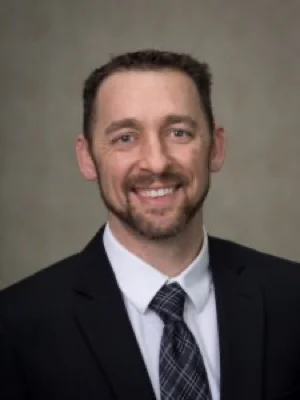 Reuben headshot tie 1 225x300 300x400 1